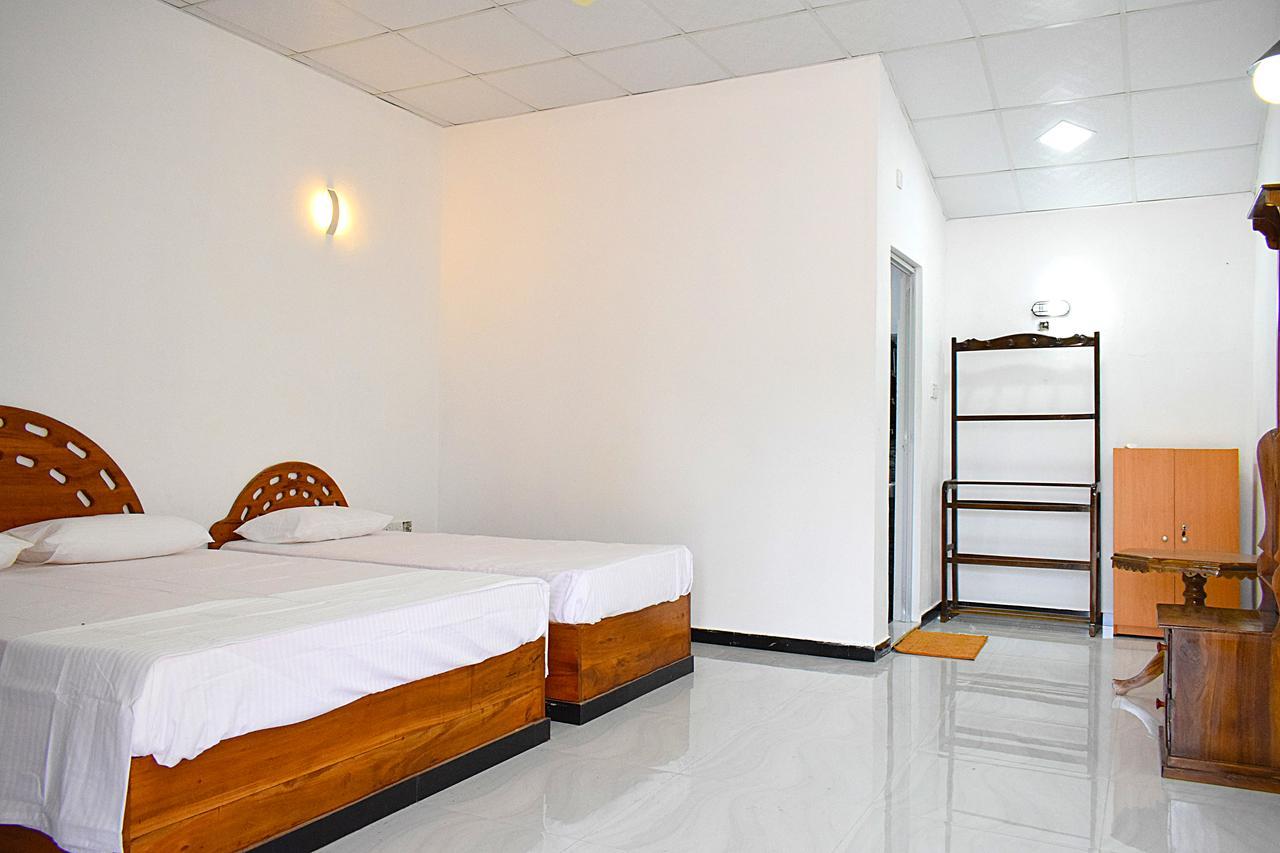 Mithra Paradise Beach Hotel Nilaveli Exterior photo